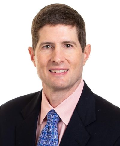 Pic of Dr. Gavin Button, Orthopedic Spine Surgeon, who discusses spinal treatment options in this blog. 